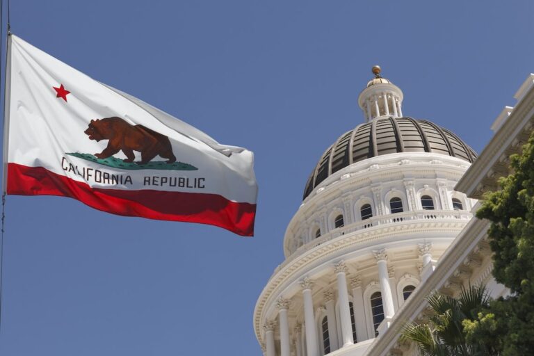 california flag and state capital building